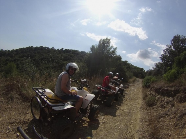  On a quad looking at the camera 